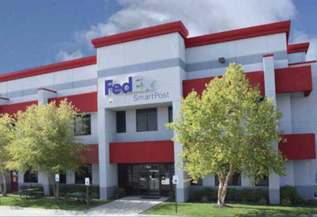 sealy acquires distribution facility building photo